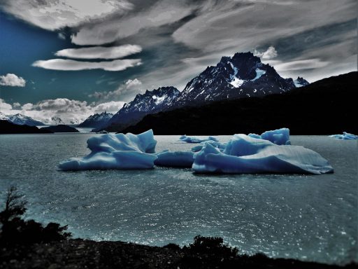 The abnormal hot weather is causing all the nearby glaciers to break up and melt – this one is already retreating at a rate of several metres a year. (Torres del paine) 